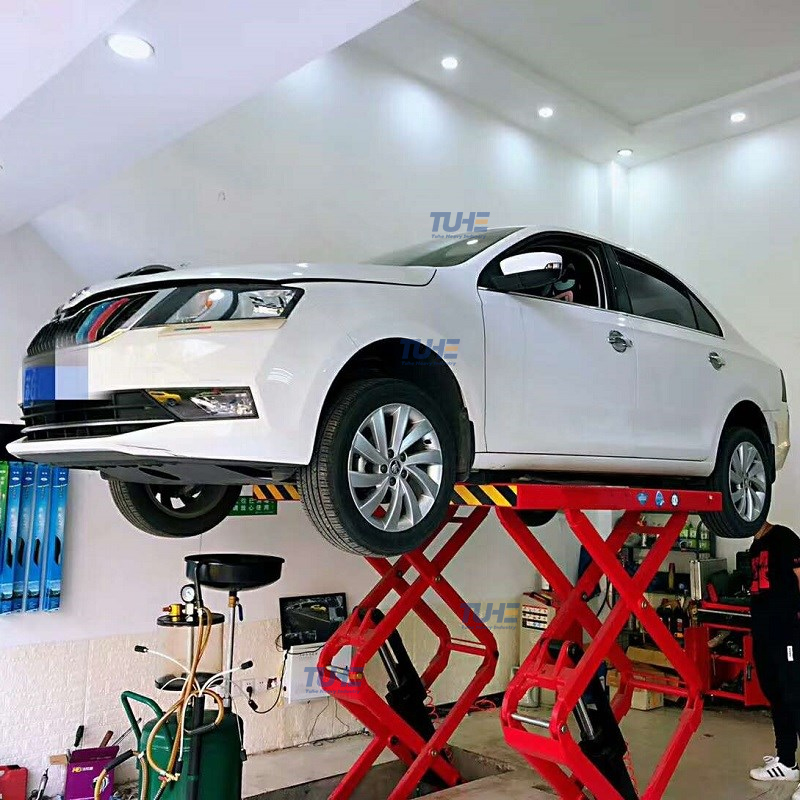 Hydraulic car lift for garage